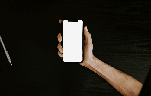 Woman Holding Iphone In Hand Mockup