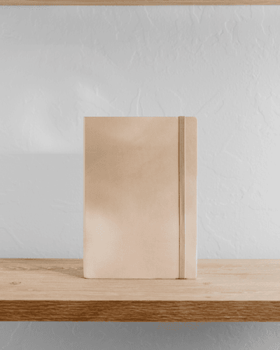 Notebook Mockup On Table