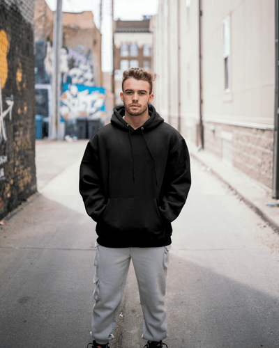 Man Wearing Black Hoodie Mockup